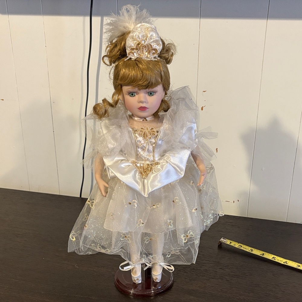 Elegant Cream and Gold Doll